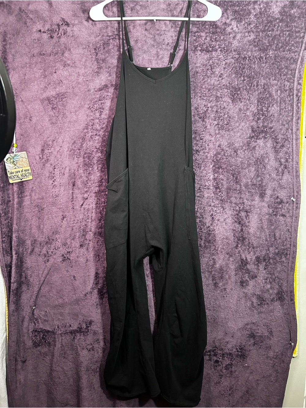 Minimalist Black Wide-Leg Romper with Pockets